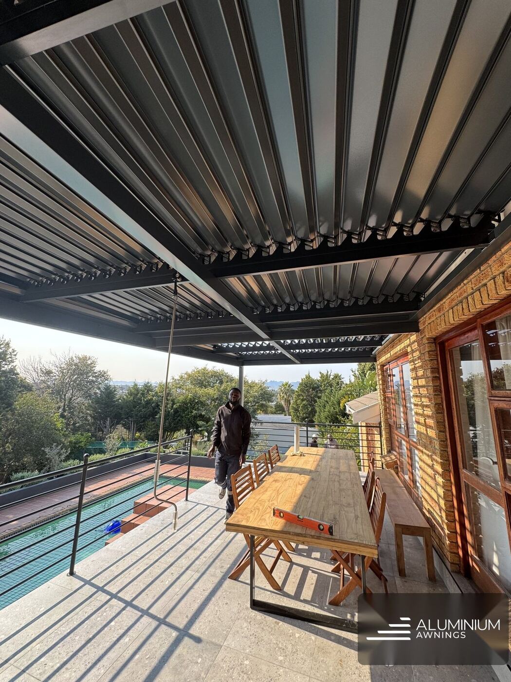 Full charcoal louvred pergola bellville