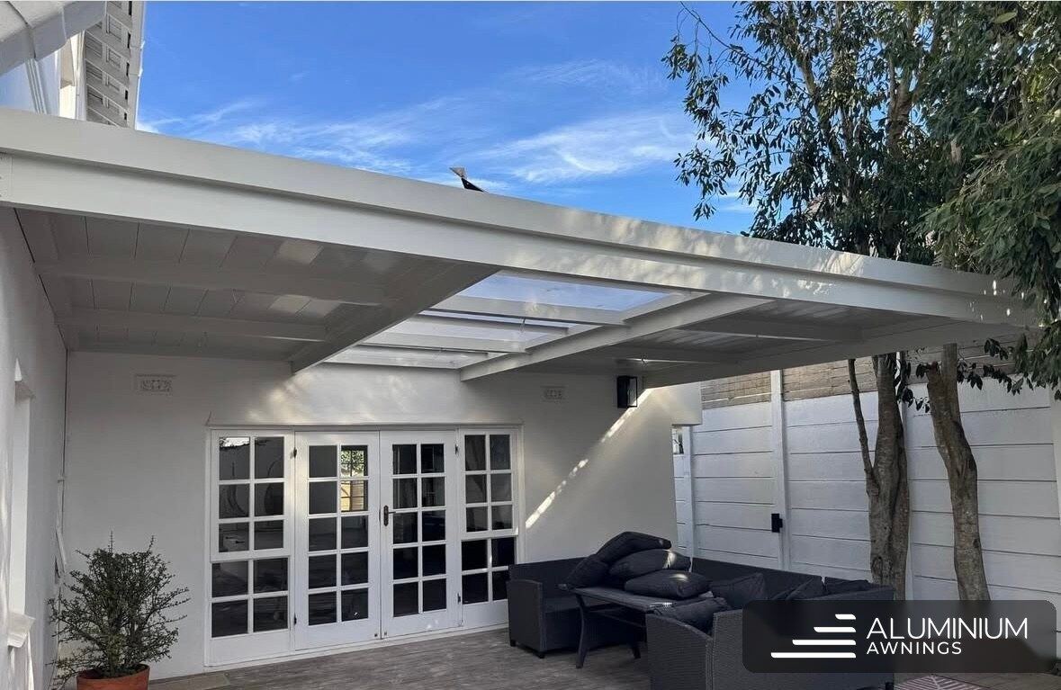 Marble white aluminium patio ceiling with multiwall polycarbonate skylight — Claremont, Cape Town Southern Suburbs