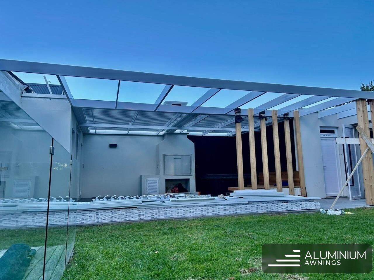White louvre awning roof on freestanding extruded aluminium pergola — Tokai, Cape Town Southern Suburbs